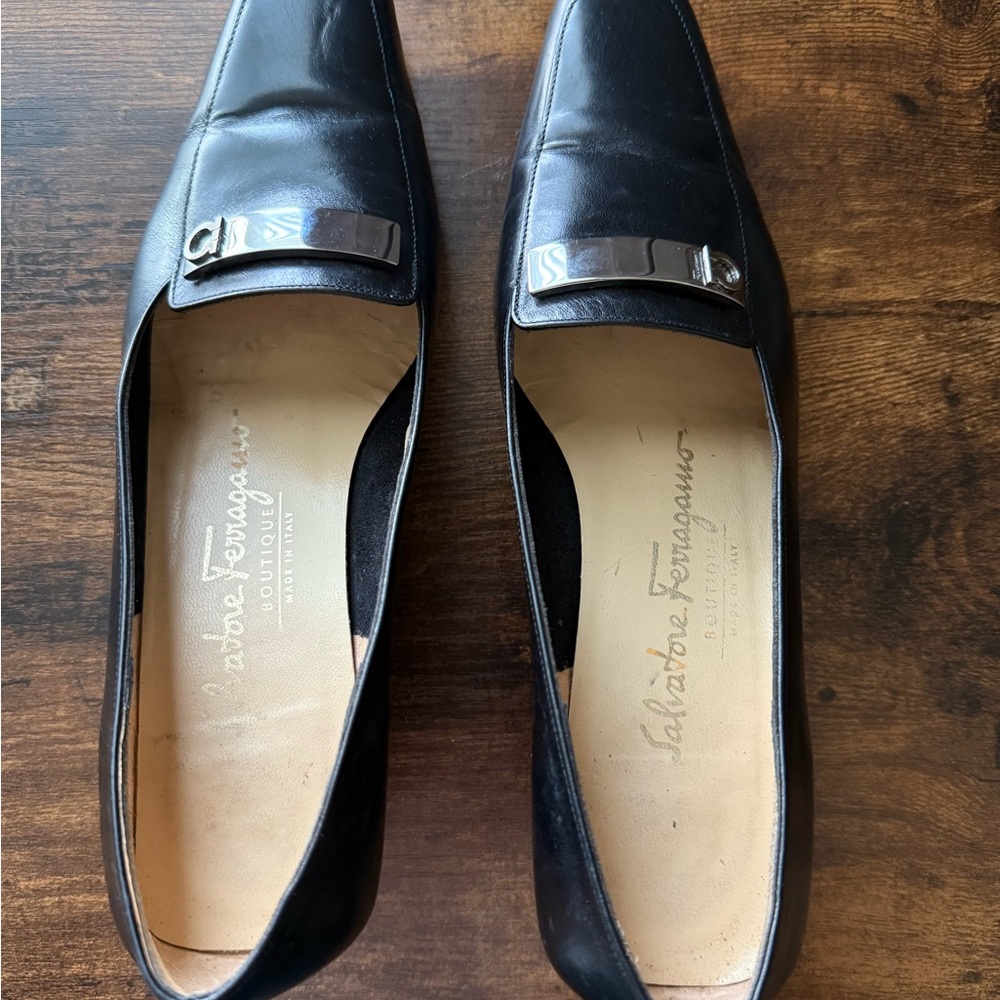 Salvatore Ferragamo Black Leather Slip-Ons with Silver Detail